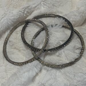 Set of 3 Silver-toned Rhinestone Bangle Bracelets.